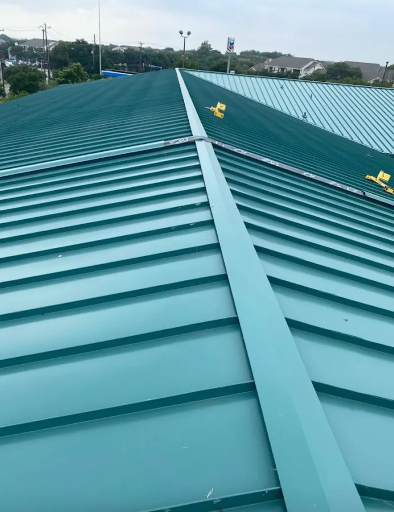Green commercial metal roof ridge and valley for Metal Roof Repair in Milan